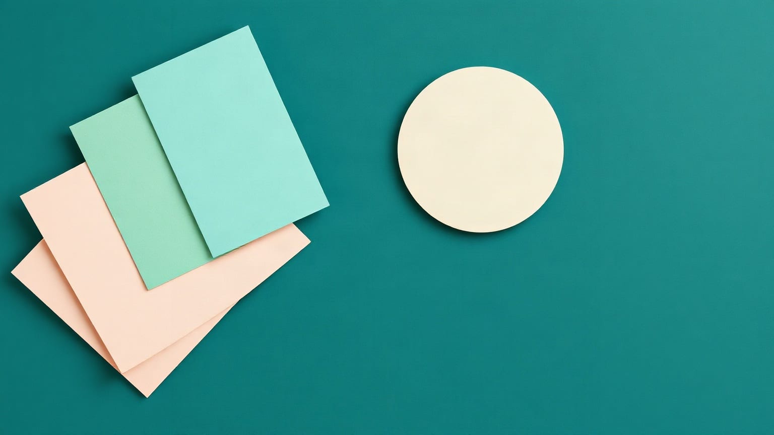 Cut-paper illustration: a fan of overlapping rectangles beside a single large disc.